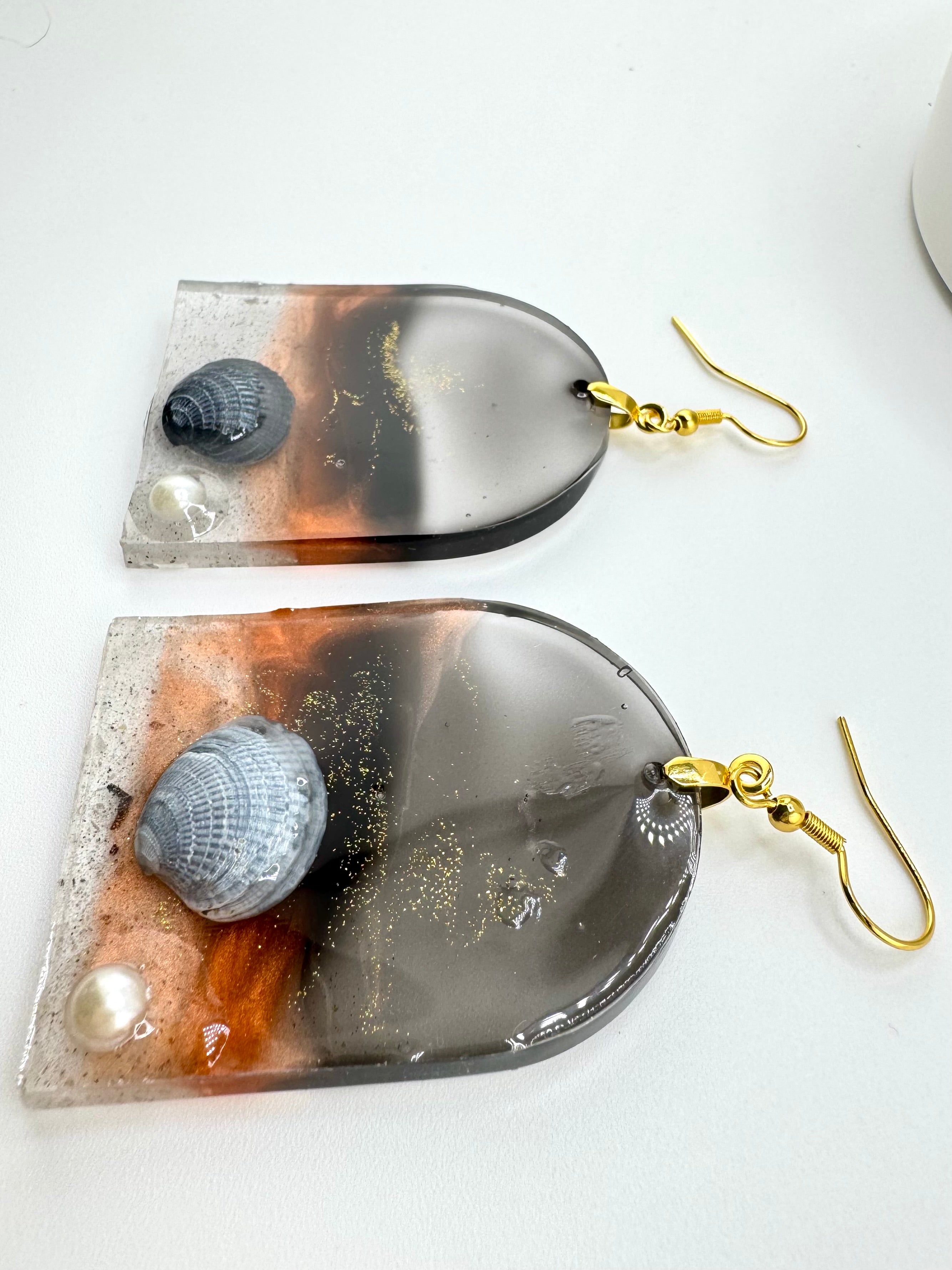 Collecting Shells At Dusk