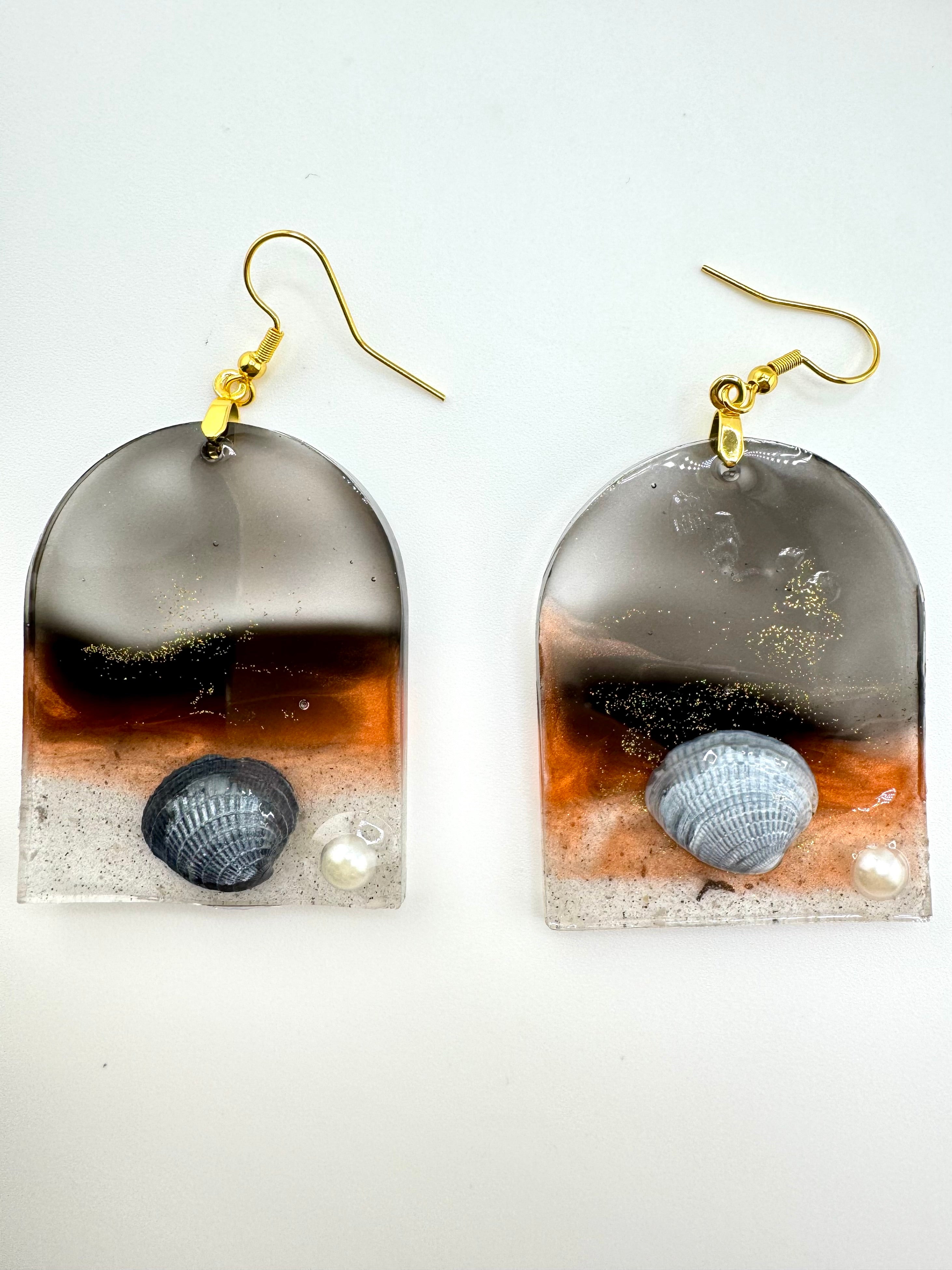 Collecting Shells At Dusk